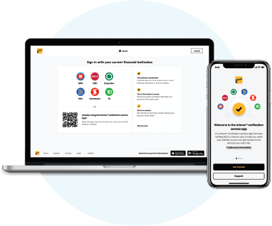 Laptop and mobile phone displaying the INTERAC Sign-In service sign-on page.