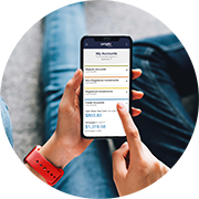 A woman checks her Simplii mortgage on her smartphone