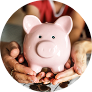 Hands hold a piggy bank